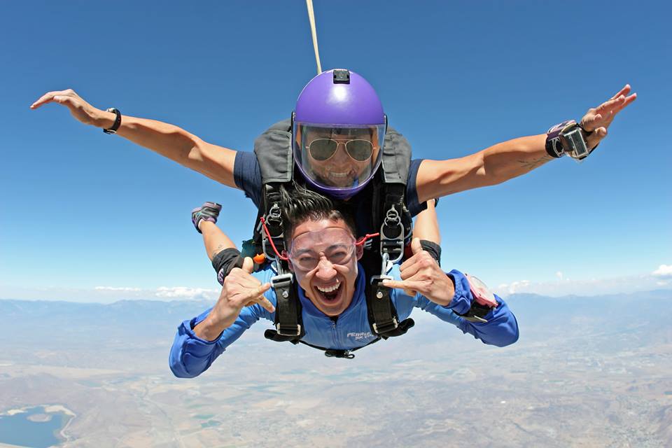 Angie Aragon in freefall with tandem student