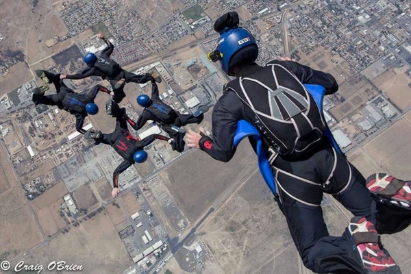 formation skydiving team jumps at Perris