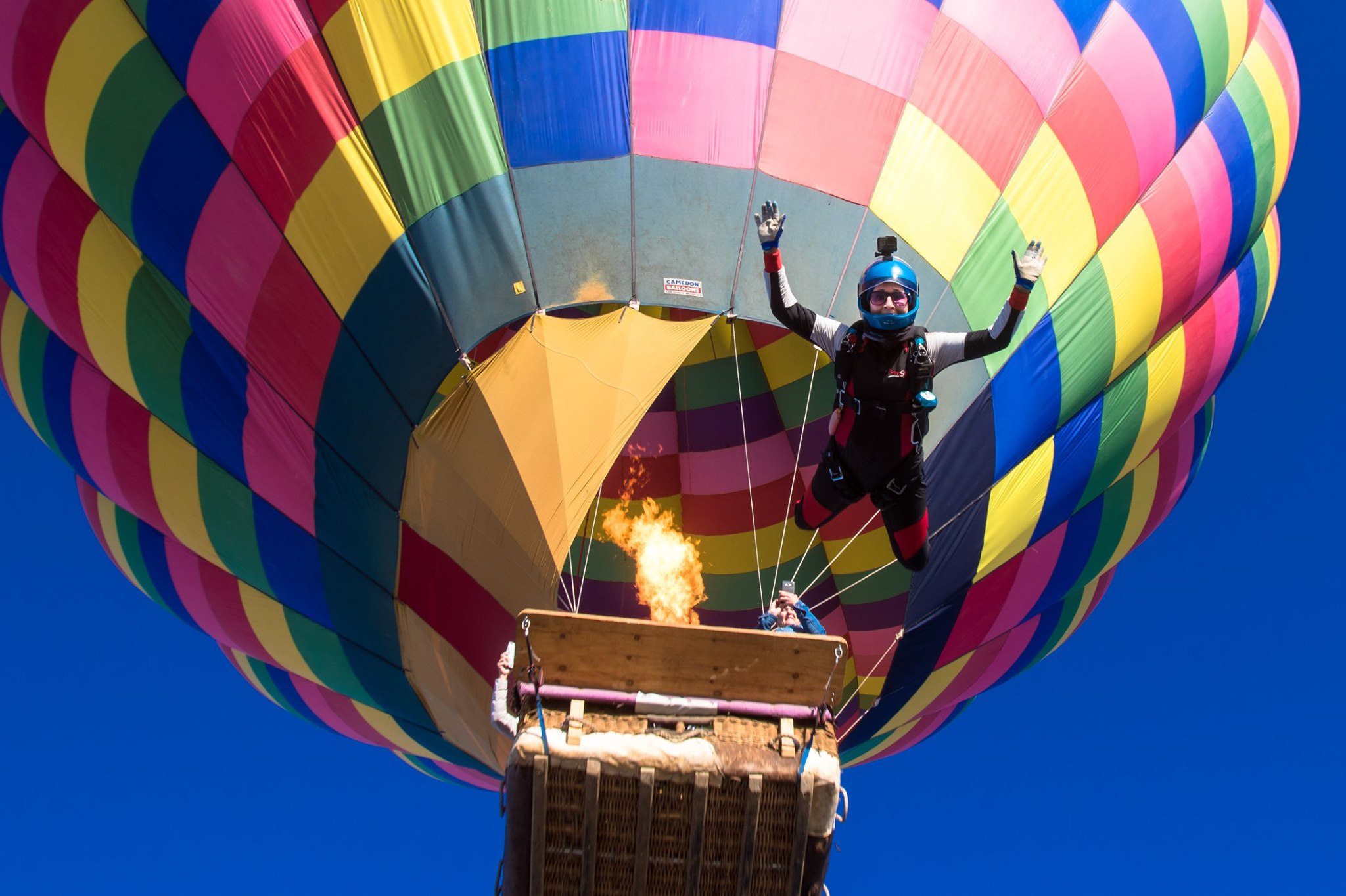 Marie Clark exits from a hot air balloon at Skydive Perris