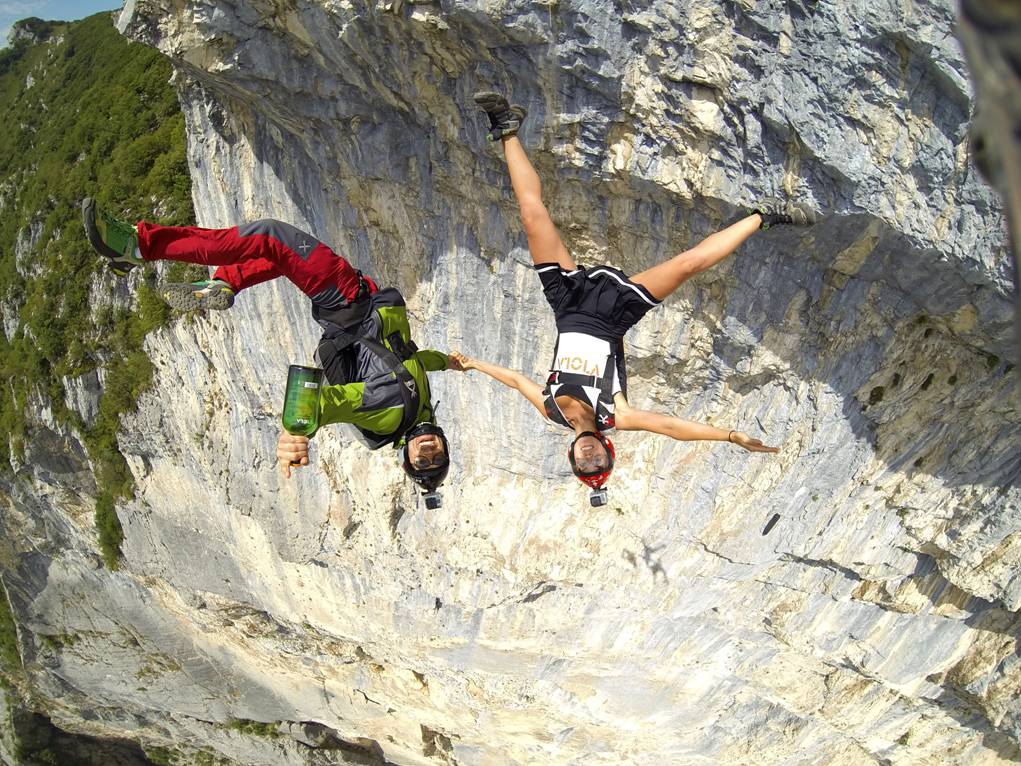 Roberta Mancino BASE jumps off a cliff.
