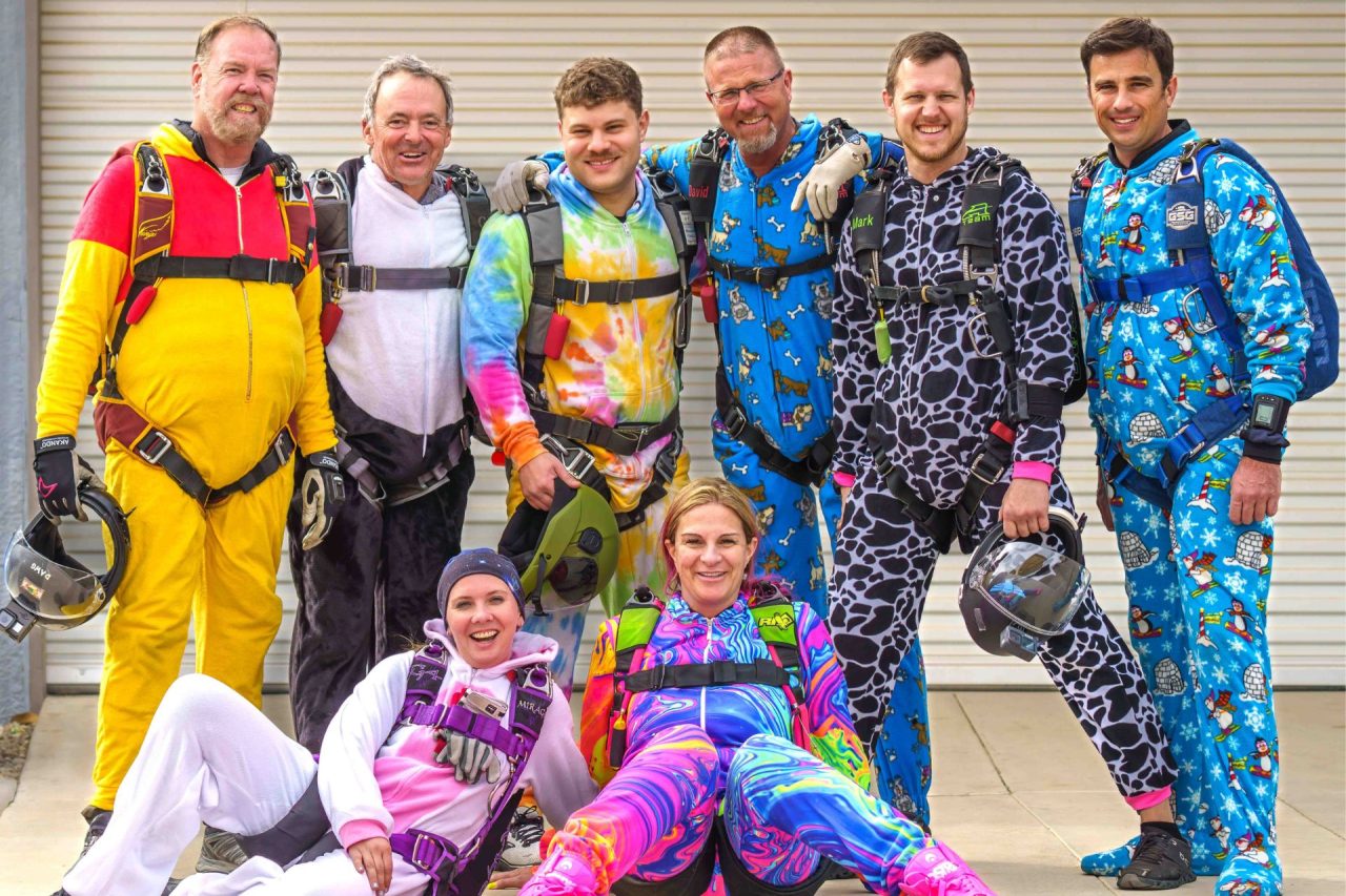 Skydivers pose in pajamas before going to make a skydive!